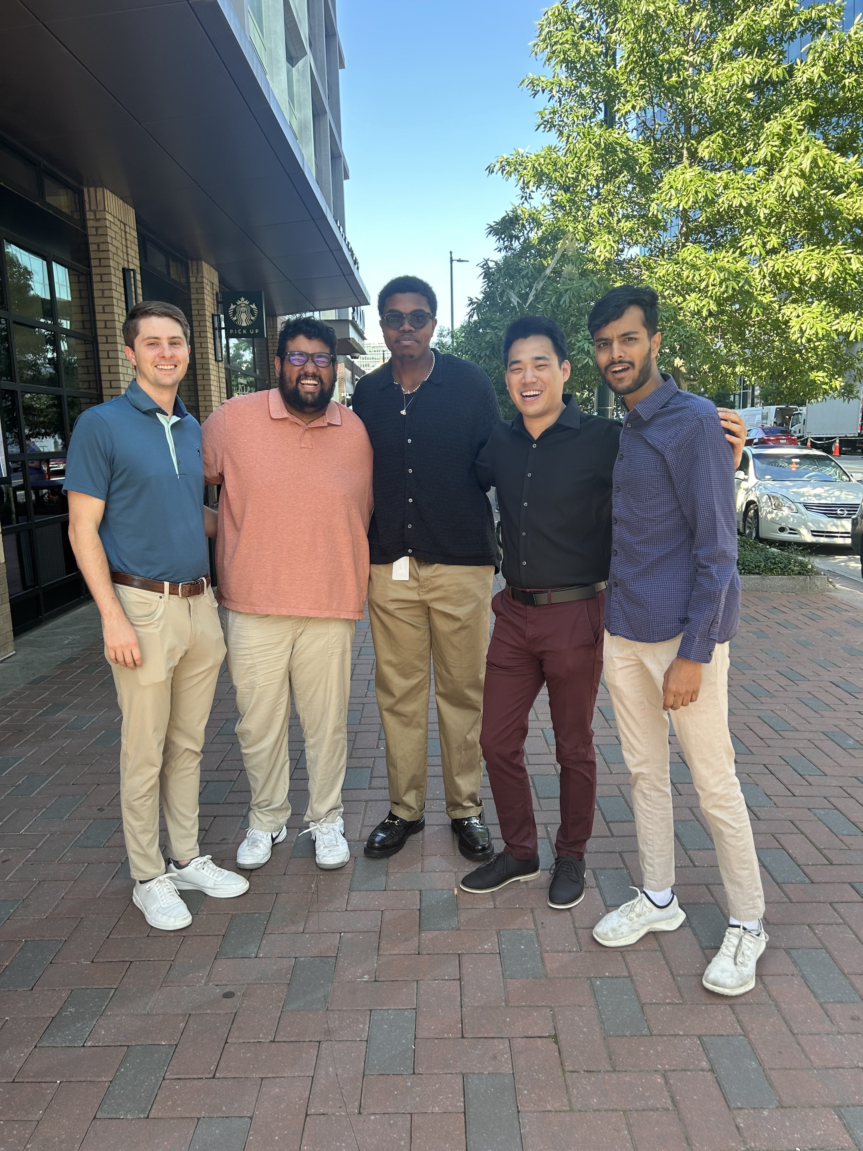 The Chello team standing next to one another on a sidewalk